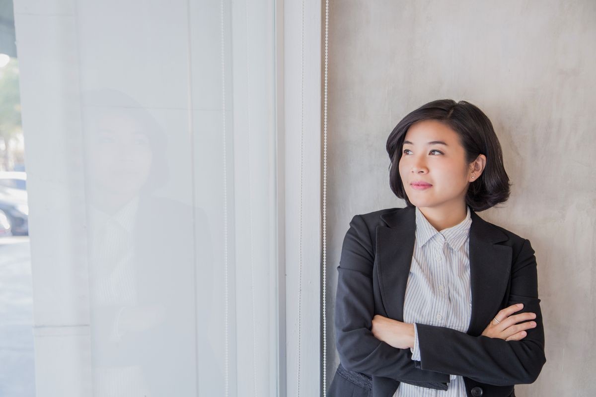 Asian business woman work in the office room.